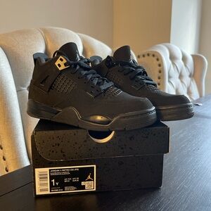 Black Cat Jordan 4s